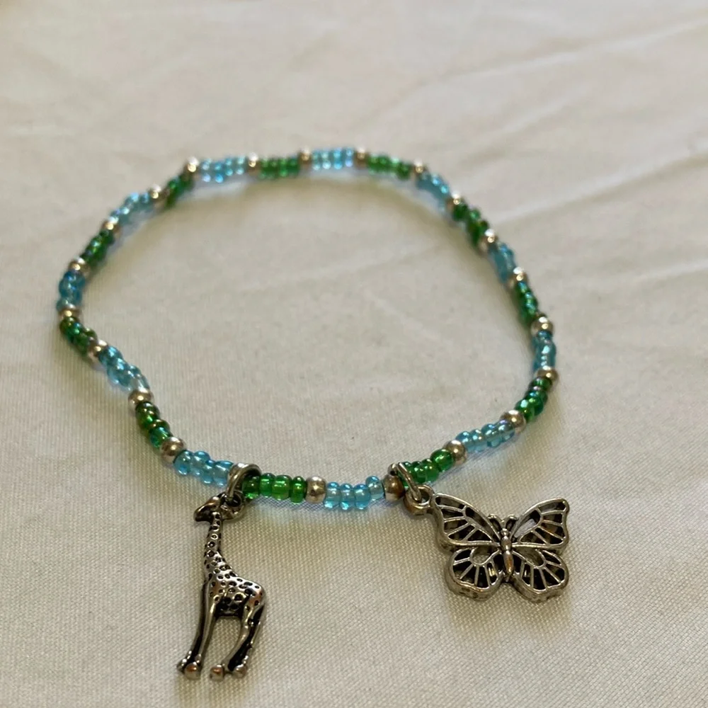 Giraffe and Butterfly green and light blue beaded bracelet Festival seashell,